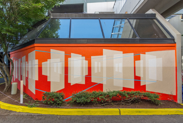 Vibrant orange mural in Salem Oregon