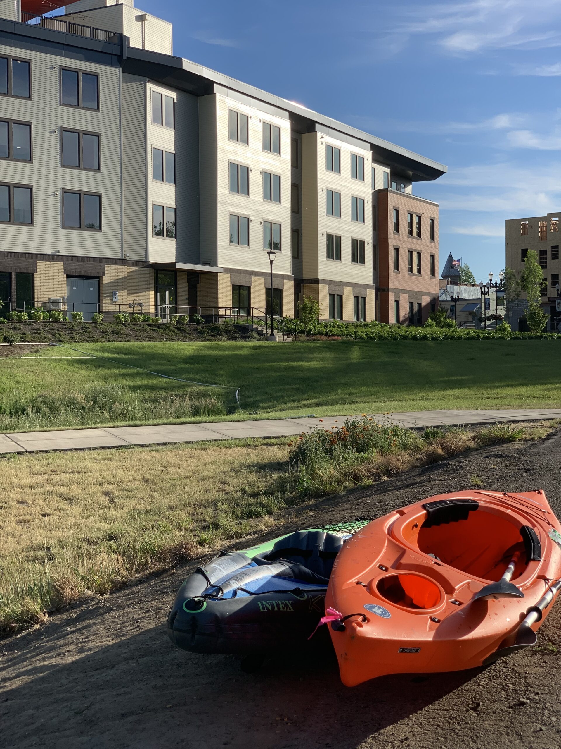 Kayaks sitting outside of Independence Hotel