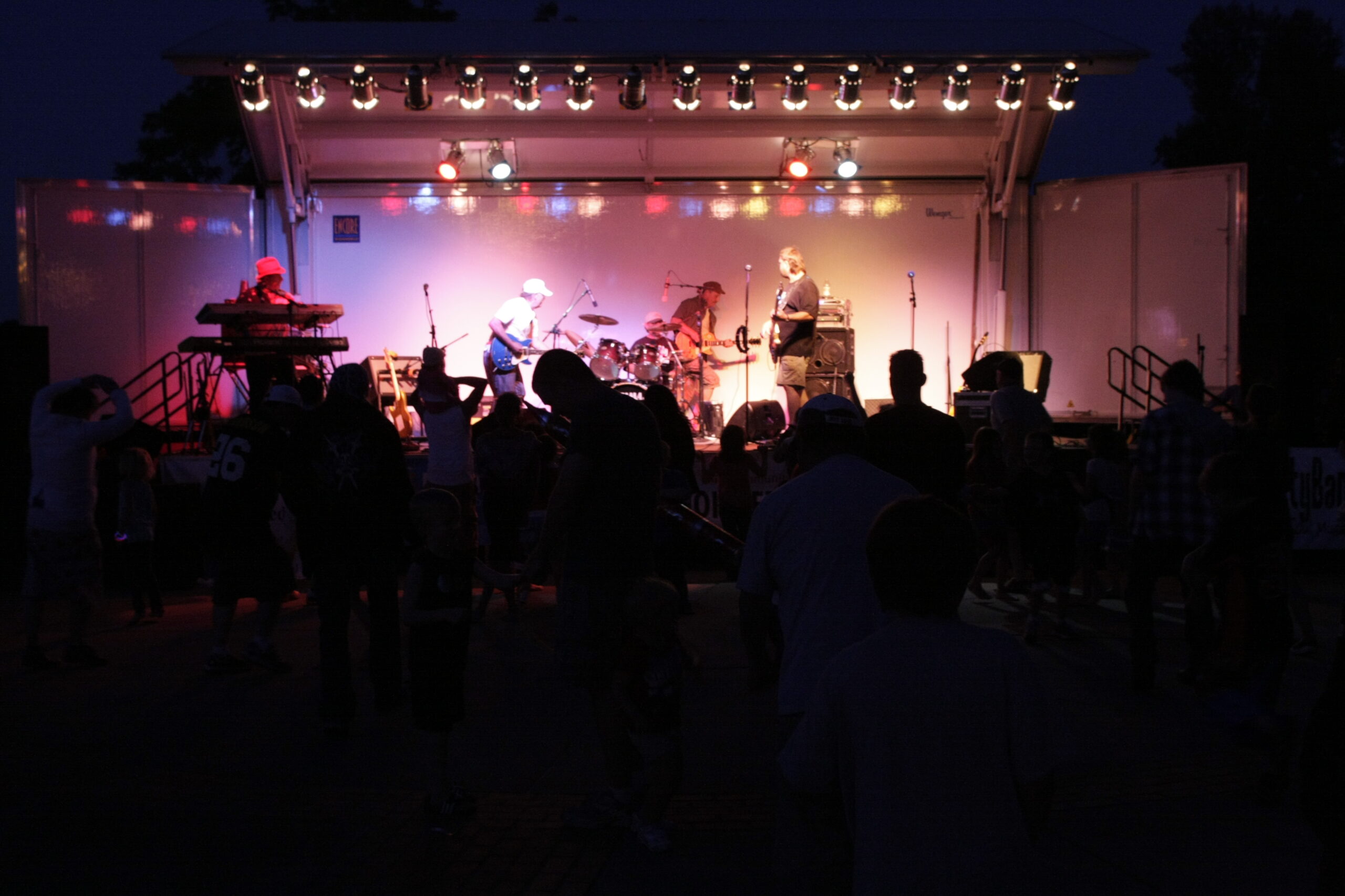 A crowd watches a concert